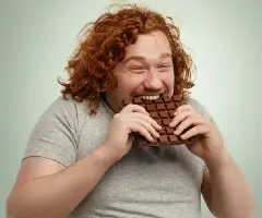 https://www.freepik.com/free-photo/plump-funny-redhead-young-caucasian-male-with-curly-hair-biting-large-chocolate_9957553.htm#query=choclate%20taste%20man&position=14&from_view=search&track=ais